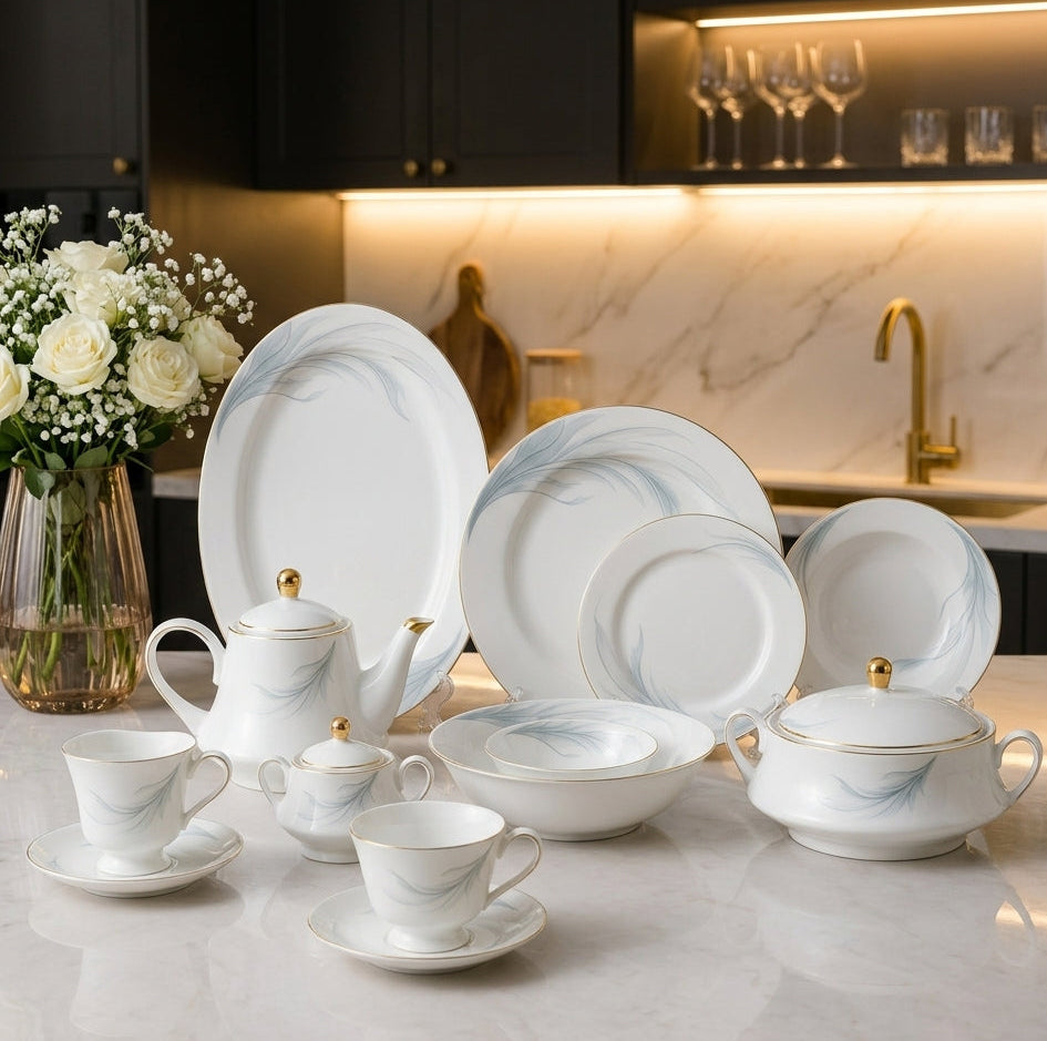 Full 61-piece bone china dinner set displayed on a marble countertop featuring white plates, serving bowls, and tea sets.