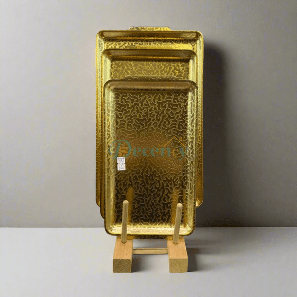 Elegant textured gold stainless steel rectangle serving tray, ideal for home décor and gift presentation in Pakistan