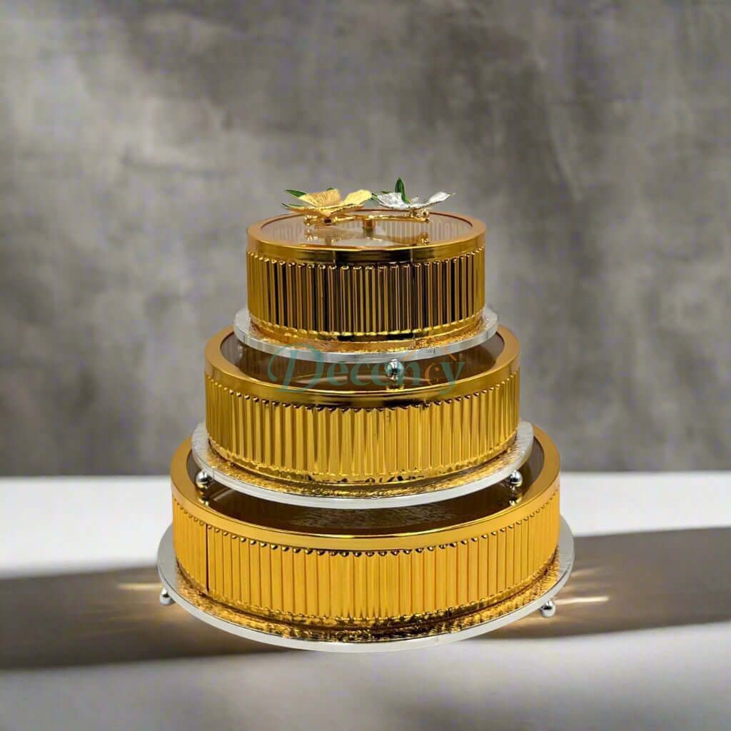 Elegant golden 3-piece storage jars ideal for organizing dry goods and enhancing kitchen décor.