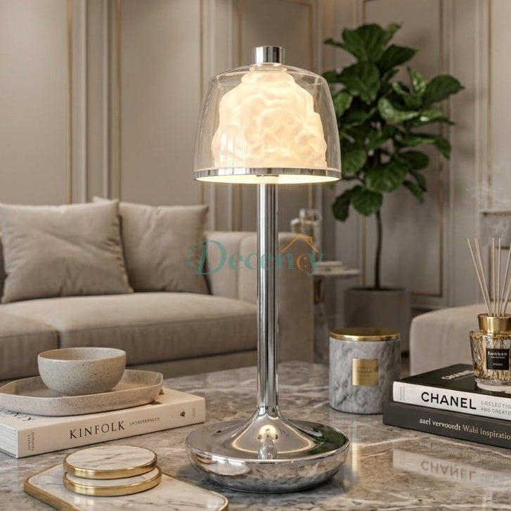 Modern Rose Dome crystal table lamp with sleek chrome base placed on a wooden coffee table
