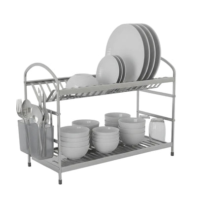 2-tier stainless steel dish drying rack placed on a dark kitchen countertop near a sink.