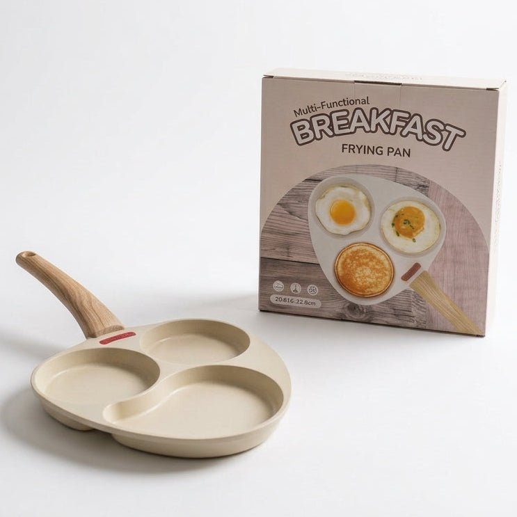 Beige 3-section non-stick egg and pancake frying pan next to product box