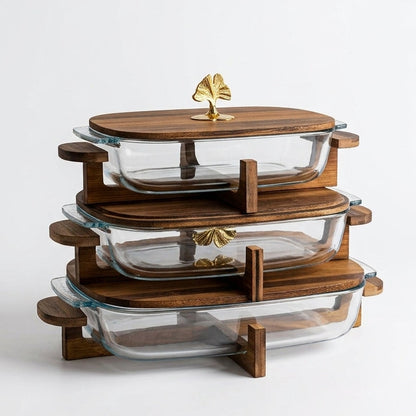 3-tier rectangular clear glass serving dishes stacked on a dark walnut wooden stand