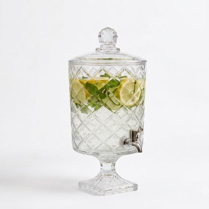 Luxury 4.5L glass juice dispenser set up on an outdoor garden table for hosting