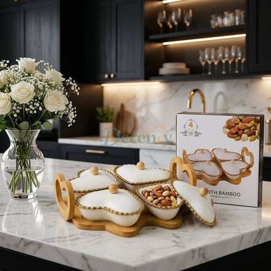 4-piece heart-shaped white ceramic snack bowls with gold beaded rims placed on a natural bamboo tray.