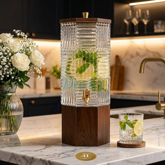 4L modern block glass beverage dispenser filled with mint lemonade on a wooden stand in a luxury kitchen