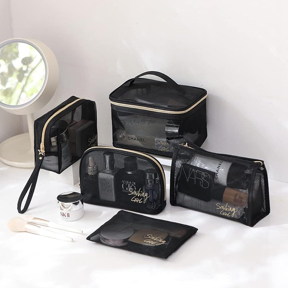 5 piece black transparent mesh cosmetic bag set displayed on white counter