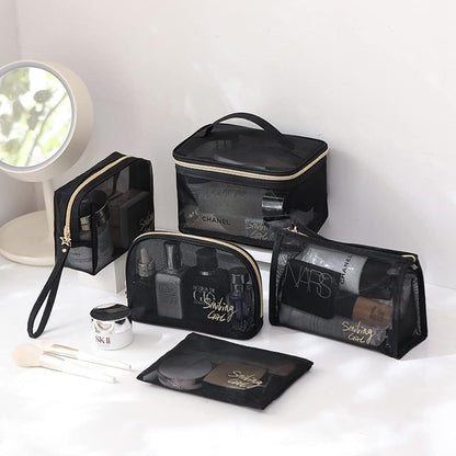 5 piece black transparent mesh cosmetic bag set displayed on white counter