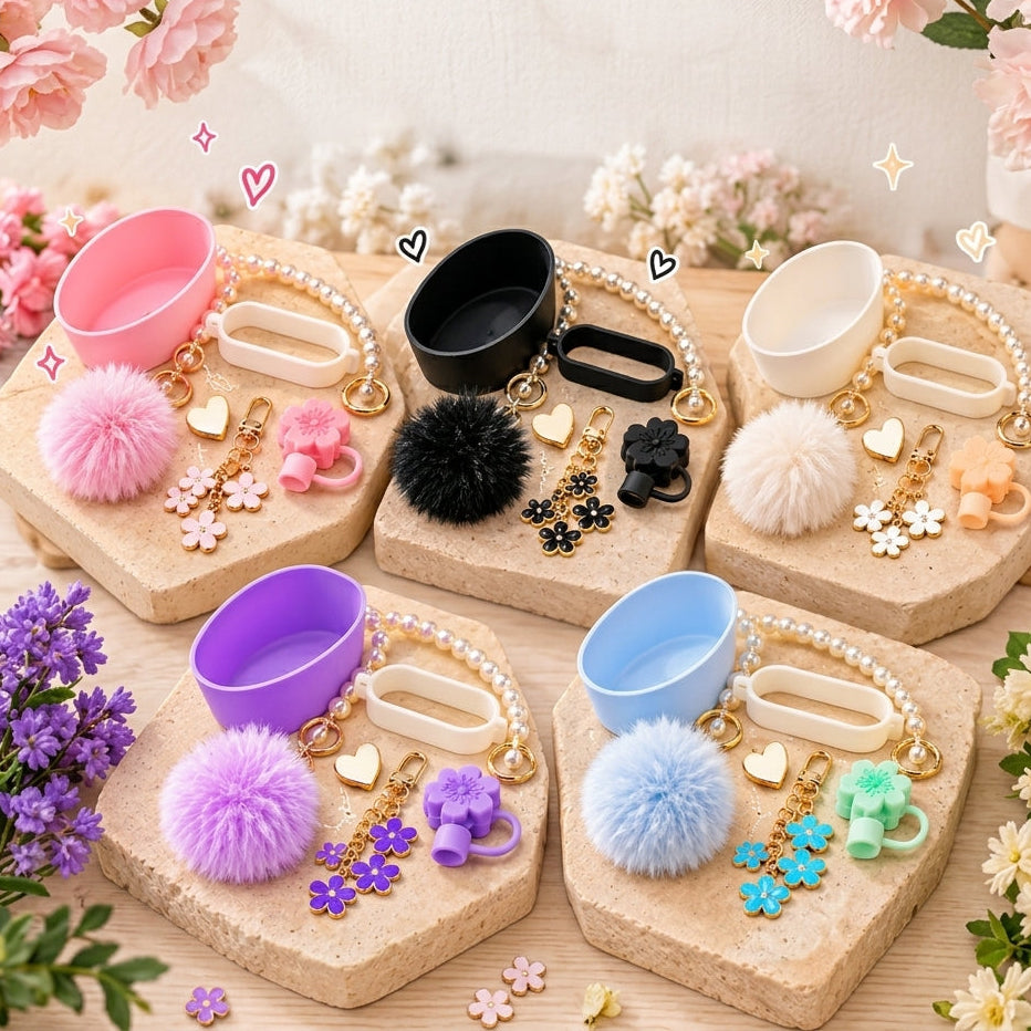 7 Pcs Tumbler Charms pack showing silicone cup holder, pearl handle charm, fur pom-pom, and flower straw stopper in pink, black, white, purple, and blue colors.