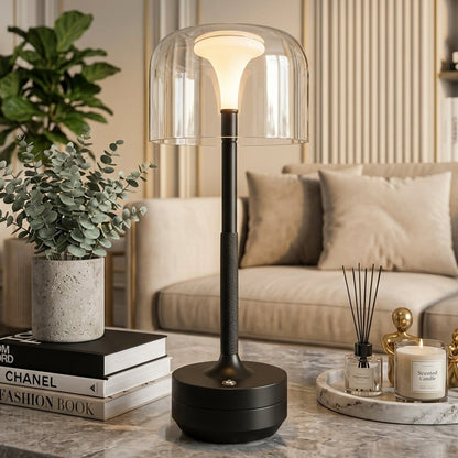 Warm glowing glass shade desk lamp placed in a modern Pakistani home setting