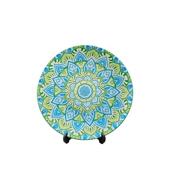 Handcrafted 10-inch blue and green mandala ceramic decorative plate on display