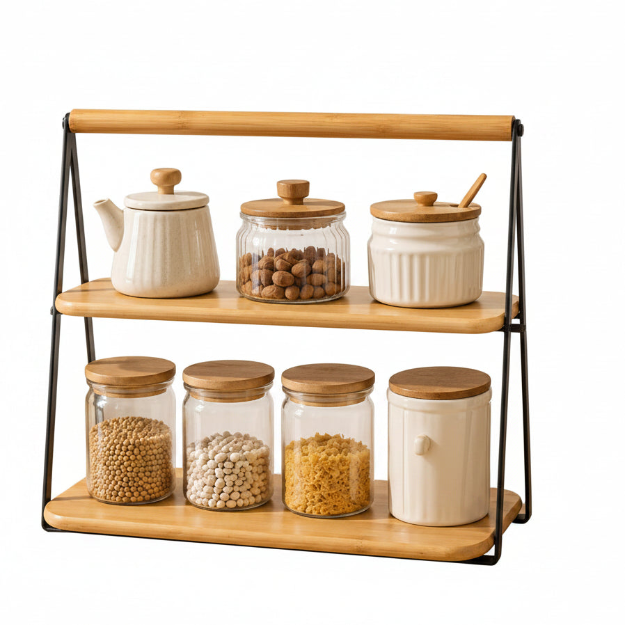 2-tier bamboo kitchen countertop organizer holding spice jars on a modern Pakistani kitchen counter.
