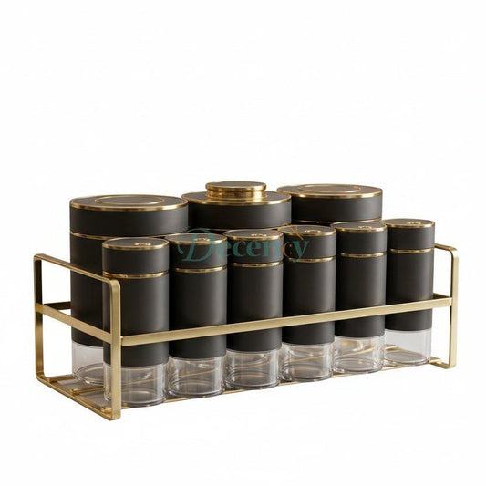 Luxury matte black and gold spice jar set with metal stand on a marble countertop