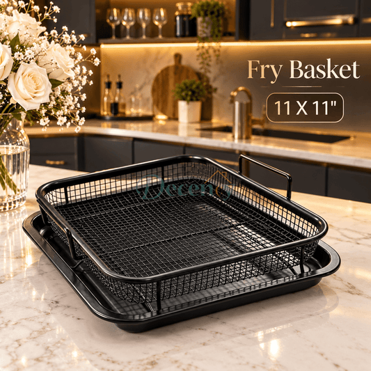 Black square non-stick mesh fry basket sitting on matching black drip tray (11x11 inches) placed on a marble kitchen counter
