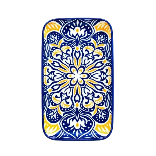Blue and yellow Moroccan design ceramic serving tray placed on a marble coffee table in a modern living room in Pakistan