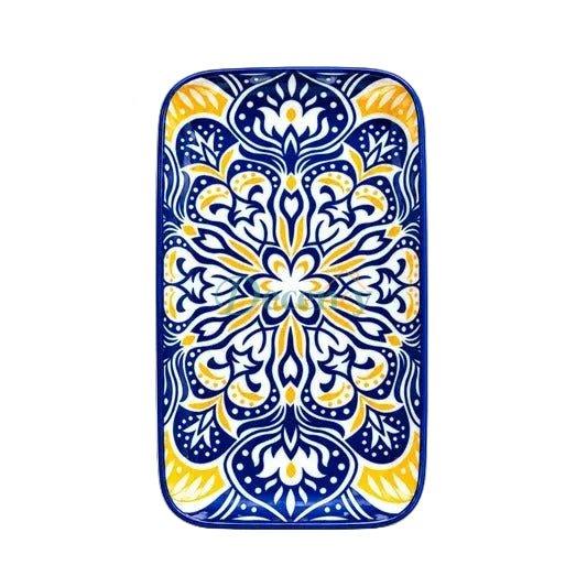 Blue and yellow Moroccan design ceramic serving tray placed on a marble coffee table in a modern living room in Pakistan