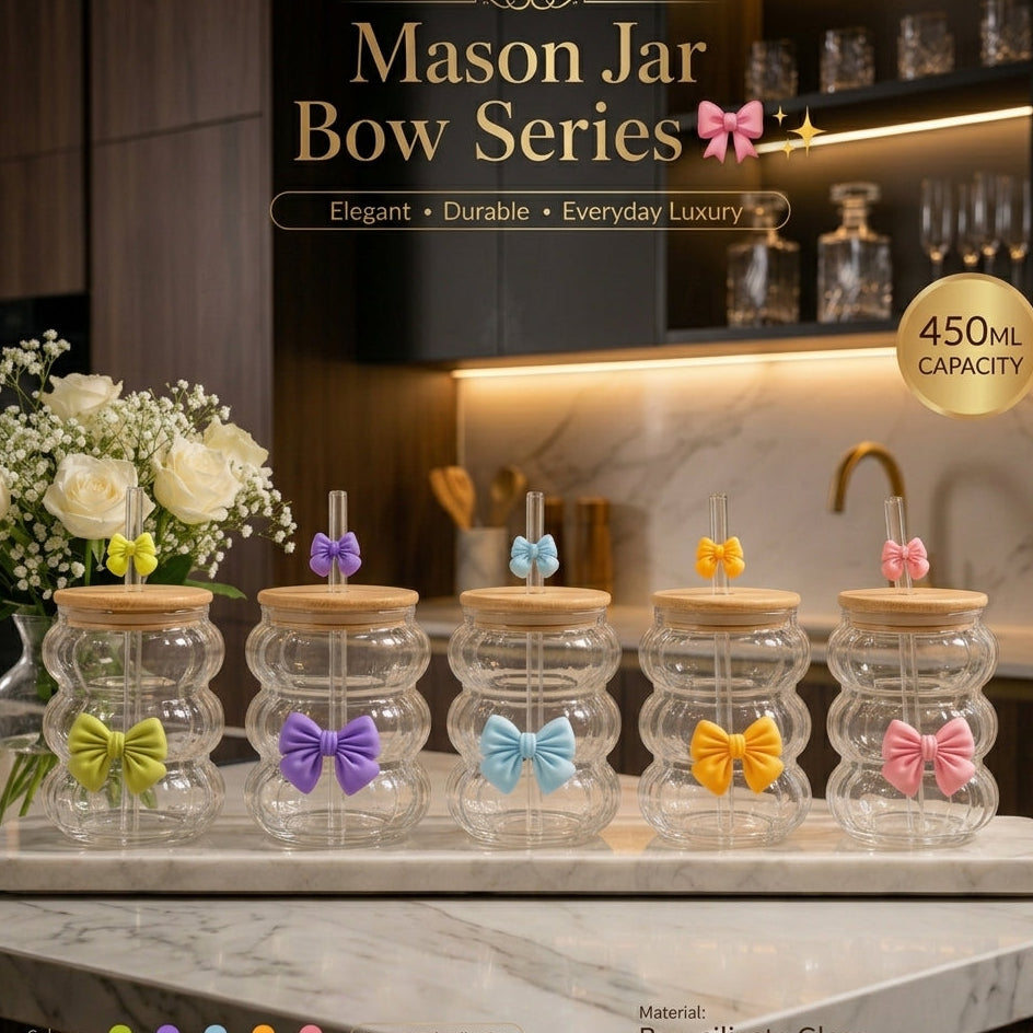 Set of 5 ribbed borosilicate glass mason jars with bamboo lids, straws, and colorful bow accents placed on a marble kitchen tray.