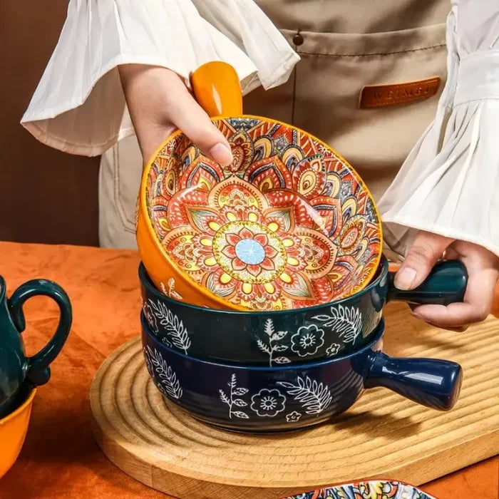 Vibrant ceramic baking bowl with handle showcasing intricate Bohemian hand-painted floral pattern