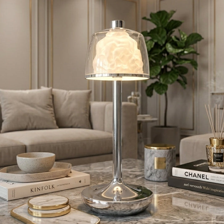 Modern Rose Dome crystal table lamp with sleek chrome base placed on a wooden coffee table