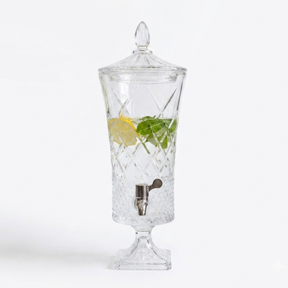 4.5-liter crystal glass beverage dispenser filled with lemon mint detox water on a formal dining table.