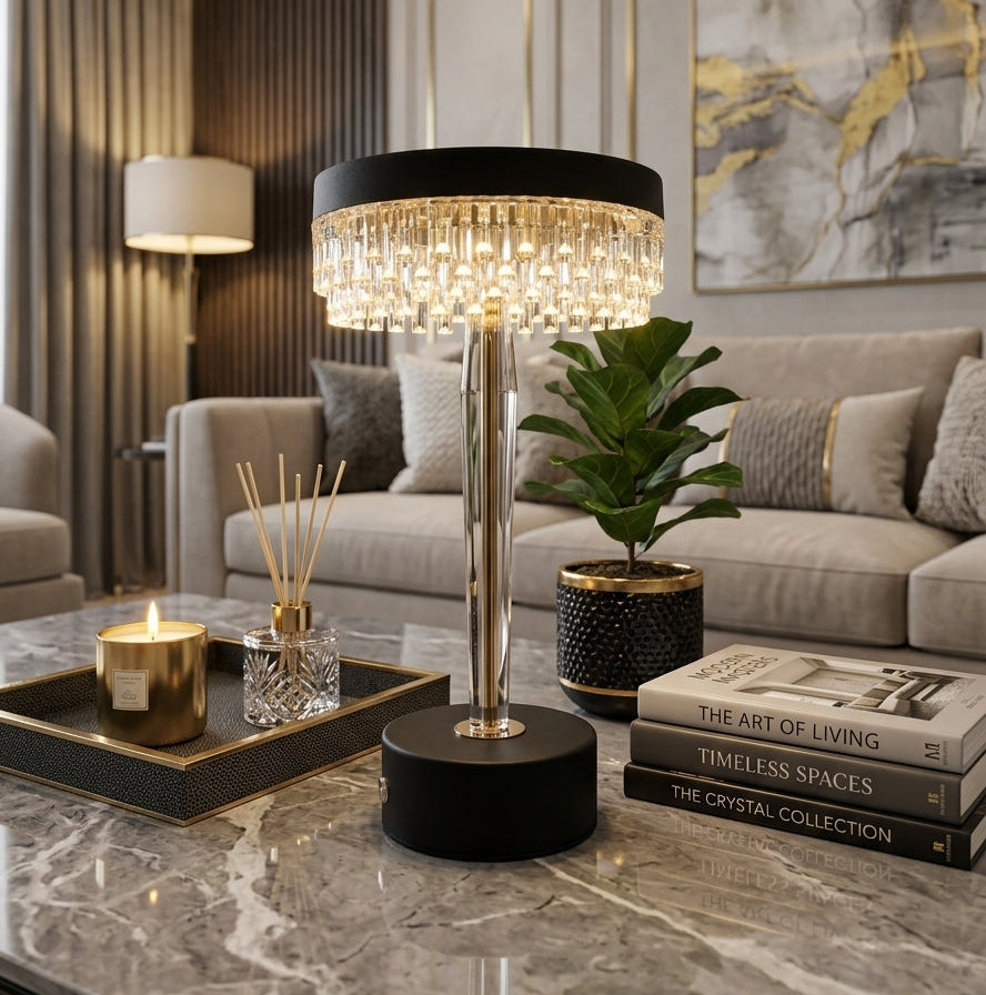 Modern crystal LED table lamp on a marble coffee table in a modern living room setting.