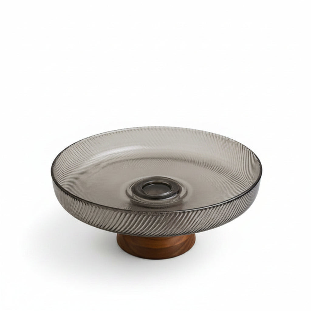 Danny Home 10 inch grey ribbed glass fruit bowl on a marble kitchen island counter