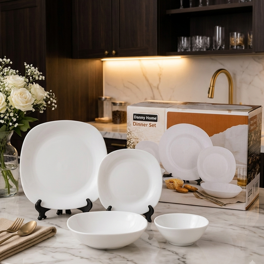 Danny Home 24-piece white square opal glass dinnerware set arranged on a marble kitchen counter with original packaging box.