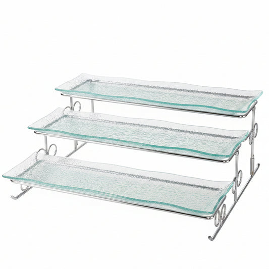 Danny Home 3-tier clear textured glass serving tray on a silver metal stand placed on a marble kitchen island.