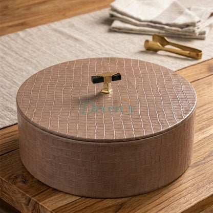 Top-down shot of the open traditional leather hotpot basket designed for fresh chapatis.