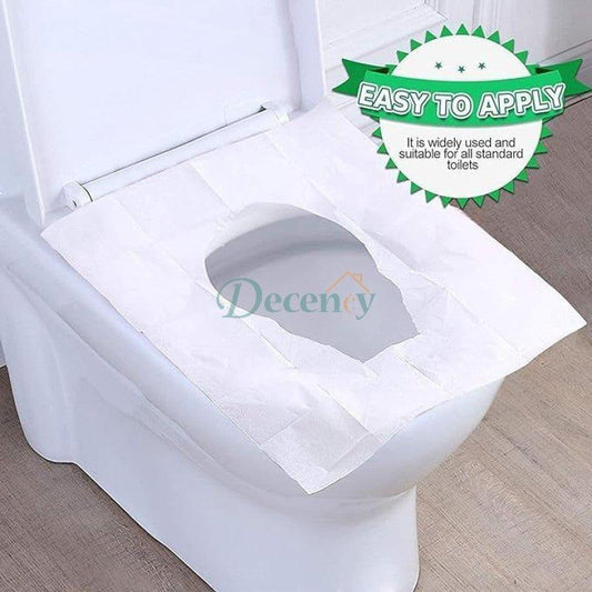 Person holding a compact pack of disposable flushable toilet seat covers over a clean commode