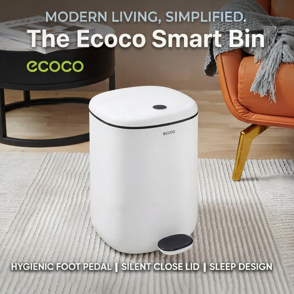 White Ecoco 11L hydraulic pedal dustbin placed on a grey rug in a modern living space