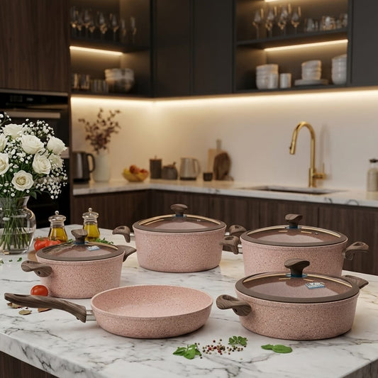 Falez 9-piece granite non-stick cookware set displayed on kitchen counter