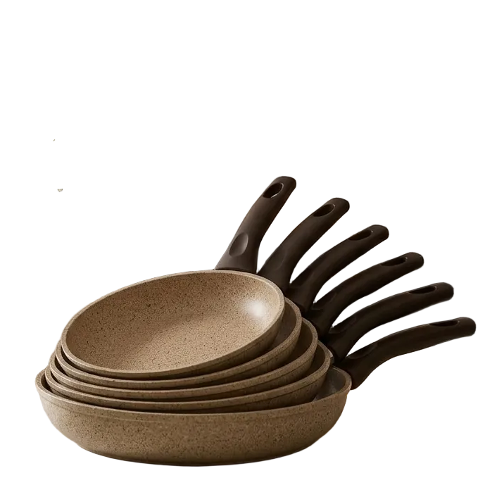 Stacked set of beige Falez Turkish granite non-stick shallow cooking pots with glass lid