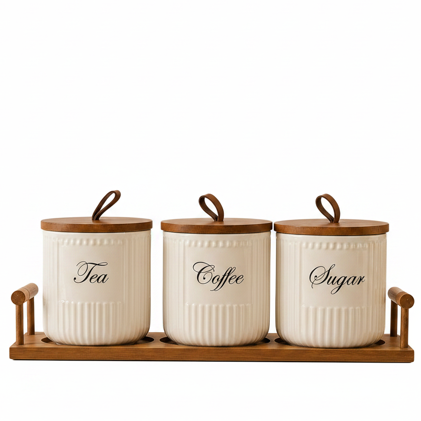 3-piece fluted ceramic storage jar set with airtight wooden lids on a matching wooden tray