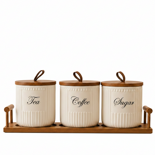 3-piece fluted ceramic storage jar set with airtight wooden lids on a matching wooden tray