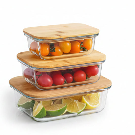 Set of three rectangular high borosilicate glass lunch boxes stacked with natural bamboo lids.