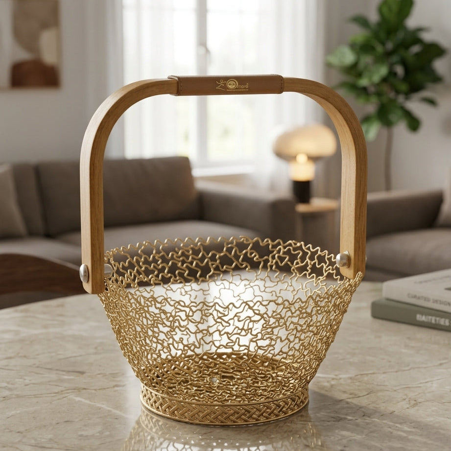 Luxury gold wire fruit basket with a smooth wooden handle placed on a marble table