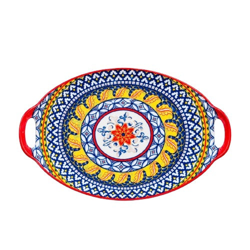 Top view of an oval handpainted ceramic serving platter with vibrant blue, yellow, and red floral designs.