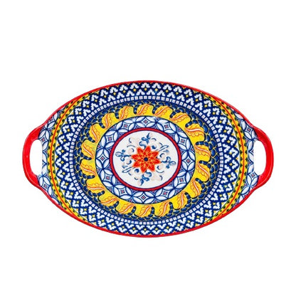 Top view of an oval handpainted ceramic serving platter with vibrant blue, yellow, and red floral designs.