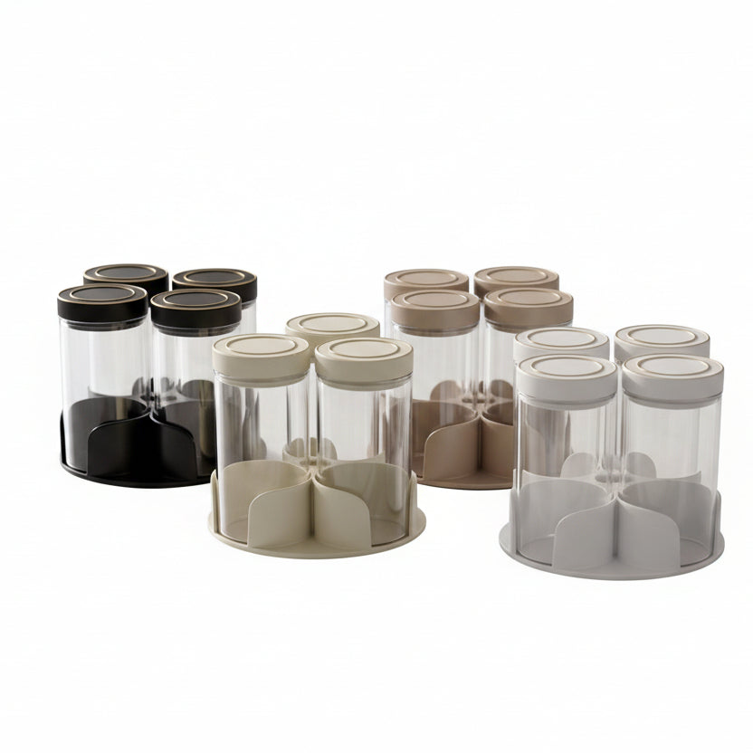 Haus Roland set of 3 spice canisters displayed on a marble kitchen countertop.
