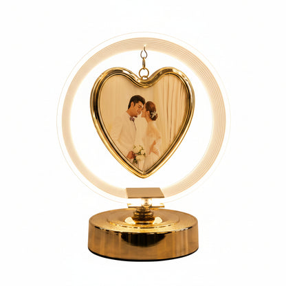 Modern heart halo LED photo frame glowing with warm ambient lighting on a tabletop