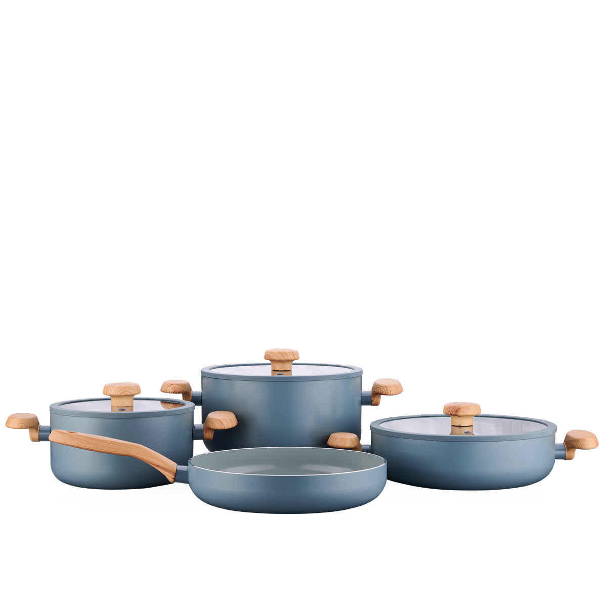 Complete Korkmaz 7-piece ceramic pots and pans set arranged on a kitchen counter.