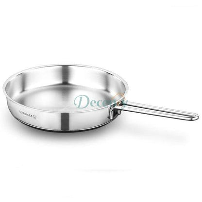 Korkmaz Perla 24cm stainless steel fry pan with ergonomic handle on a kitchen counter in Pakistan.