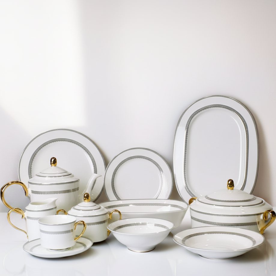 Complete 61-piece luxury bone china dinner set in white and grey with elegant gold handles, featuring a teapot, bowls, and serving platters