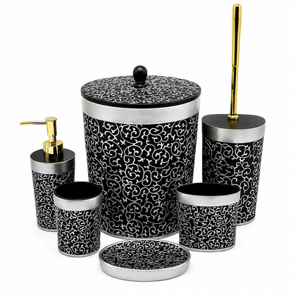 Complete 6-piece black and silver filigree pattern bathroom accessory set displayed on a vanity table