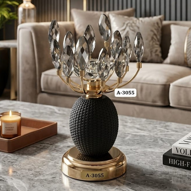 Luxury crystal table lamp model A-3055 with gold base placed on a marble table in a living room
