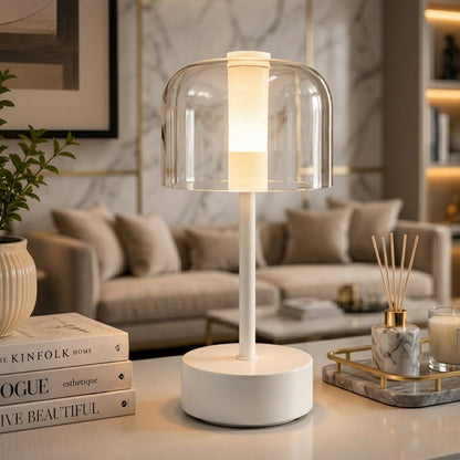 Ambient lighting setup showing a minimalist white dome desk lamp in a living room.