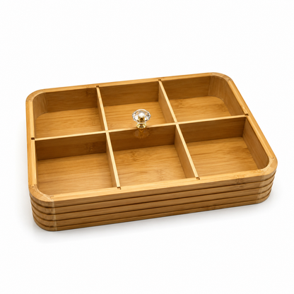 Top view of a luxury wooden dry fruit serving box filled with almonds, cashews, and walnuts.
