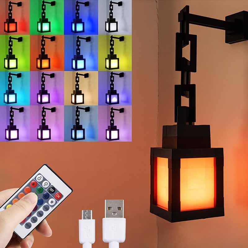 Minecraft torch LED wall light mounted on a bedroom wall showing warm orange lighting.