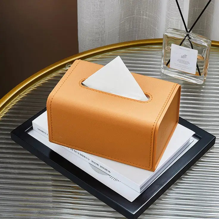 Luxury leather texture modern tissue dispenser box on a wooden coffee table in Pakistan.